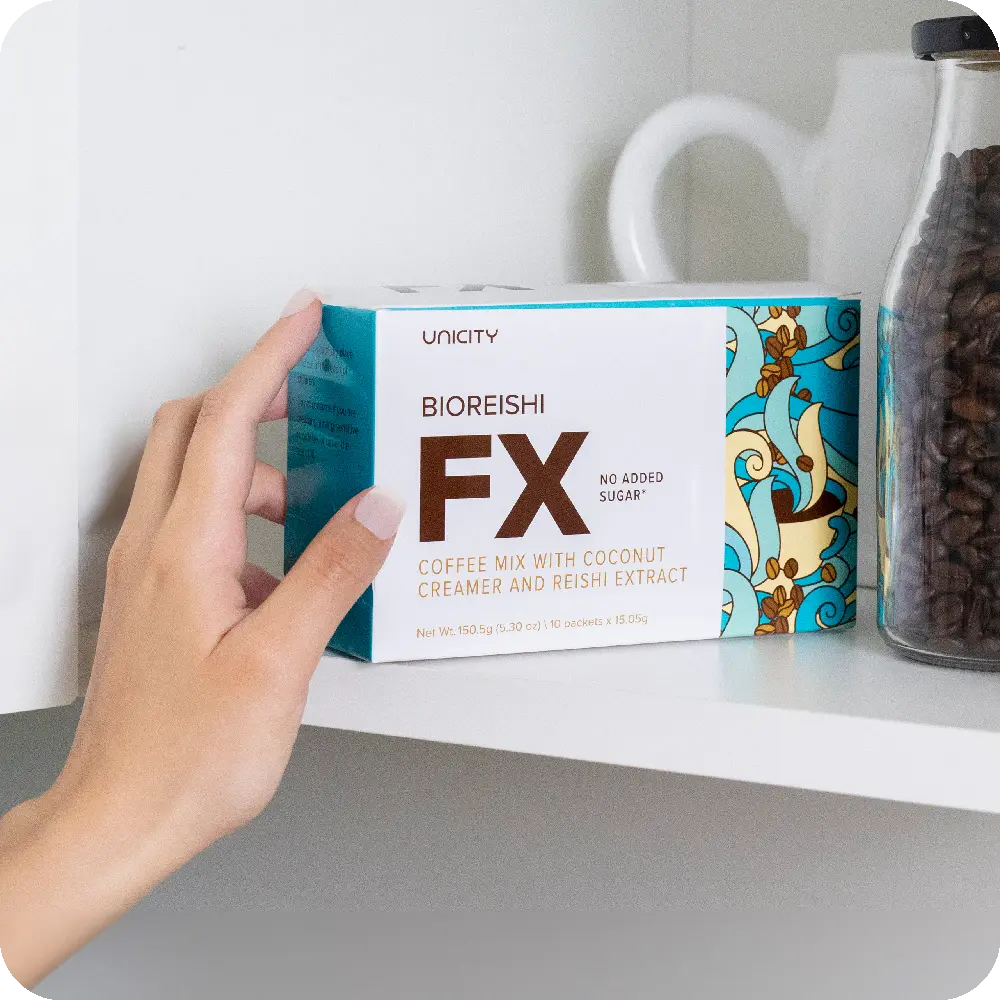 Person putting box of BioReishi FX onto shelf