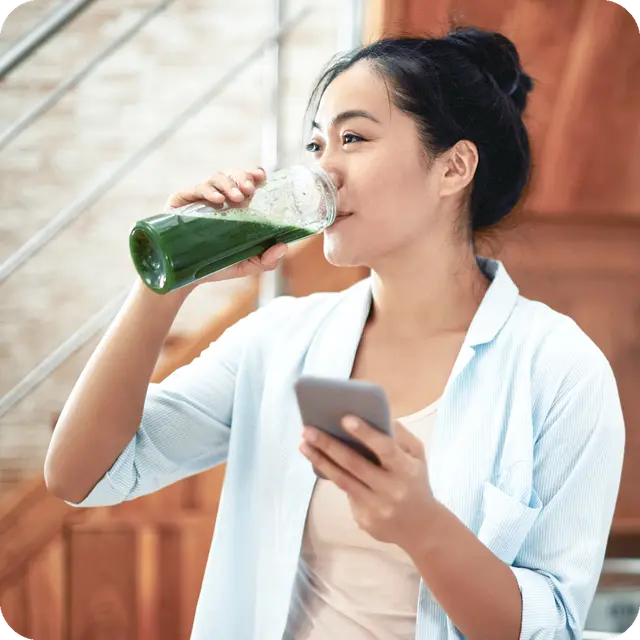 Lady drinking Super Green+