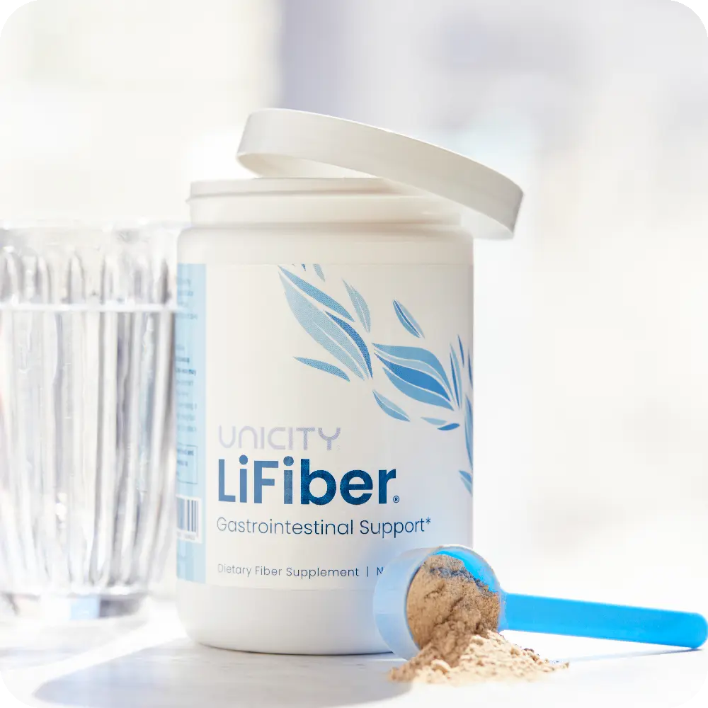 LiFiber de Unicity junto a una cucharada y un vaso