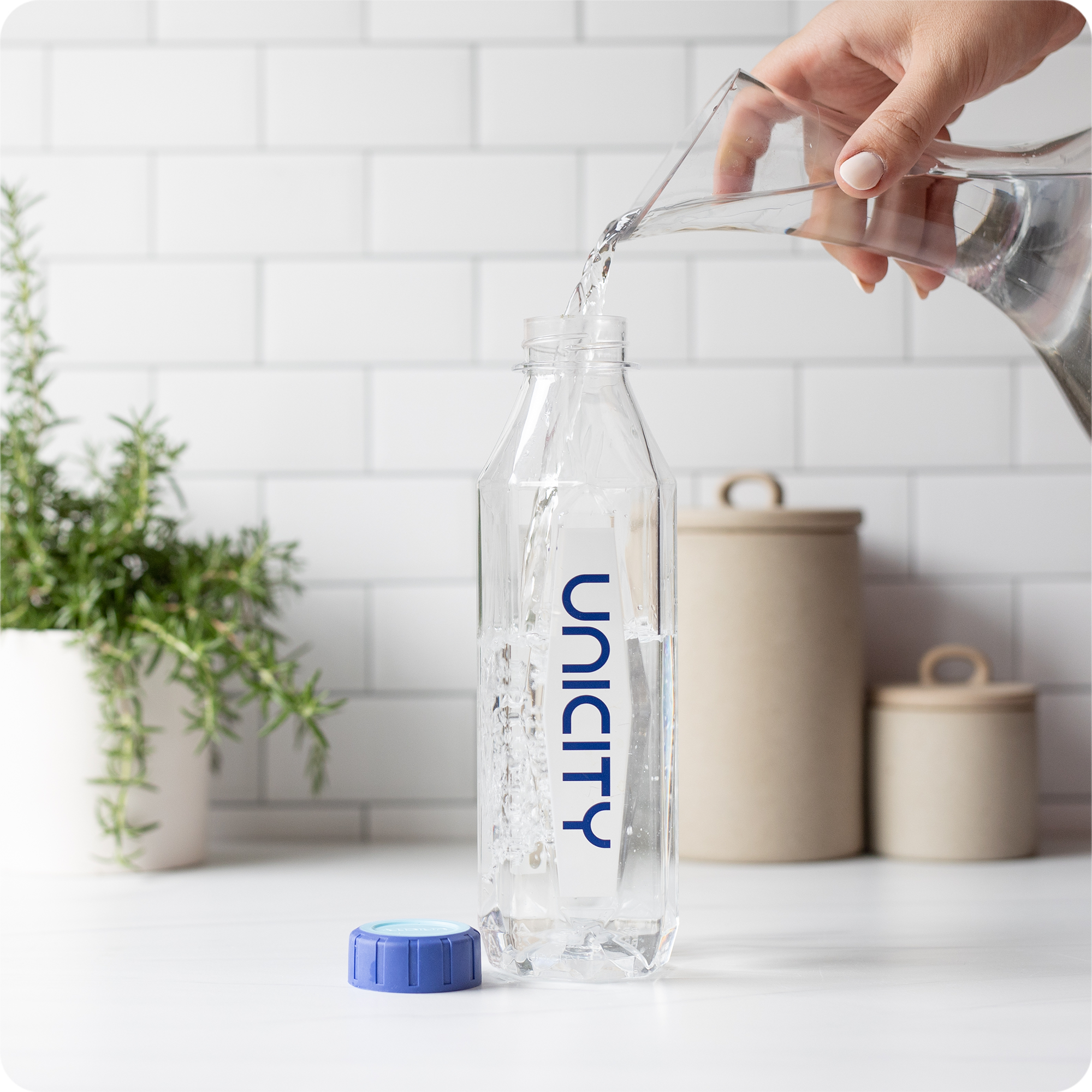 Unimate stick pack on countertop next to Unicity Diamond Bottle